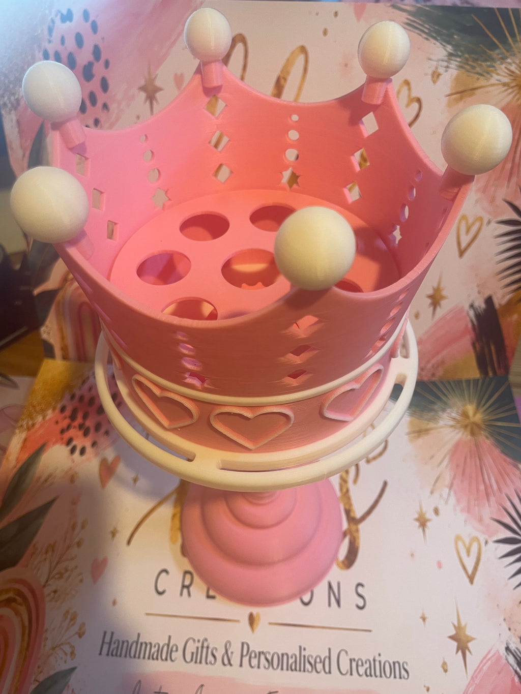 Pink crown lip gloss holder